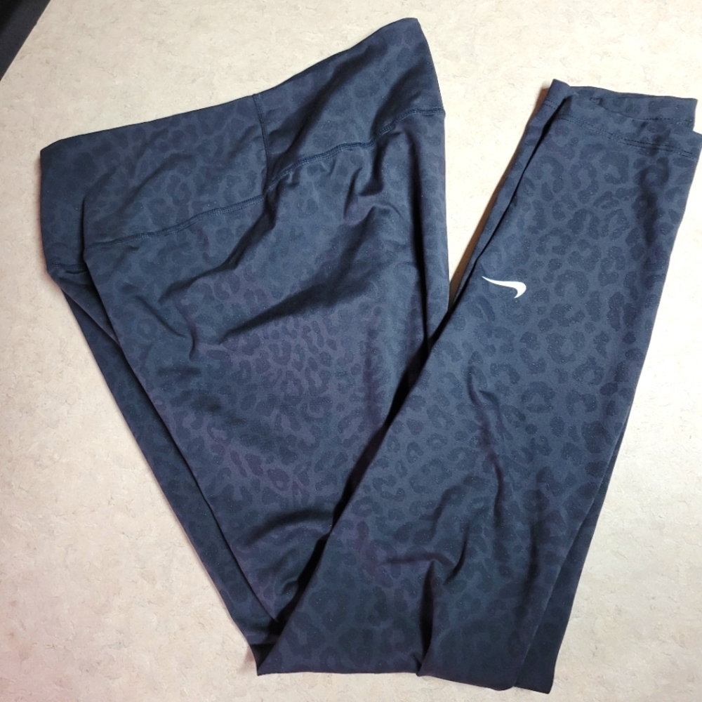Gently Used size med mid rise Nike Dry-fit one Leopard Print